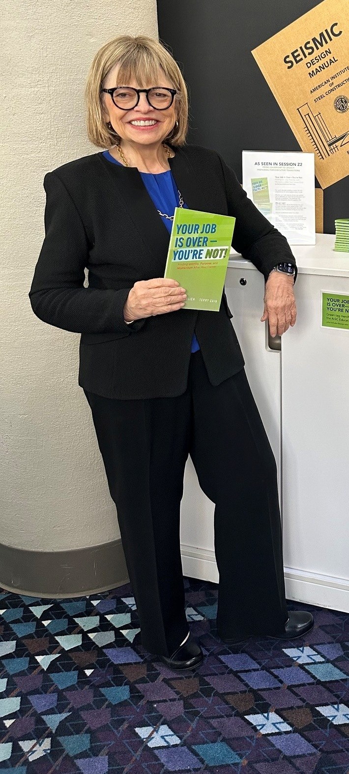 Derinda Ehrlich with the book at the NASCC Steel Conference